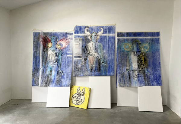 Installation of 3 pastels on the wall and a relief on the ground